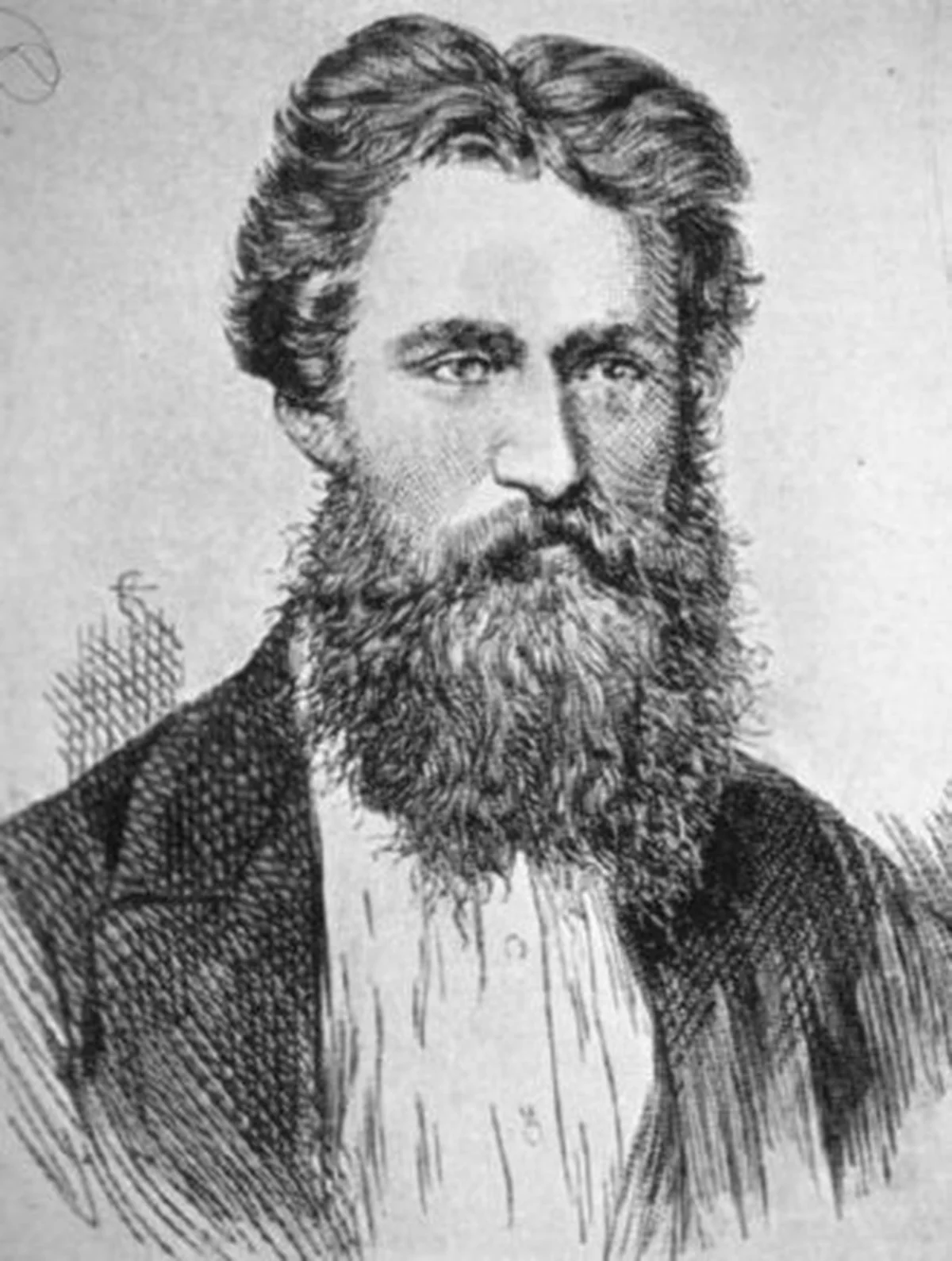Czarno-biały portret George’a Smitha z brodą.